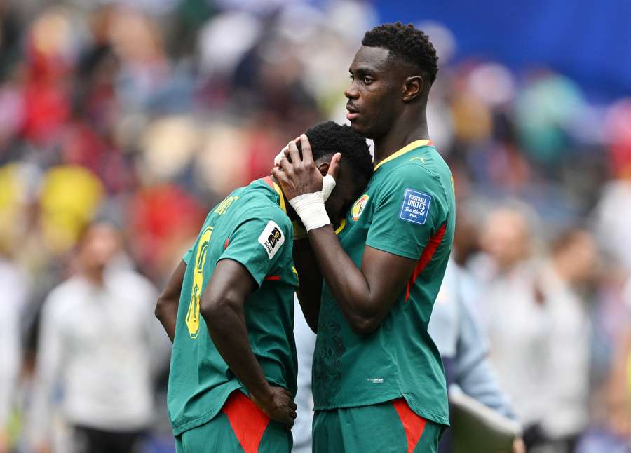 Moussa Niakhate consoles Lamine Camara. Moussa Niakhate consoles Lamine Camara.