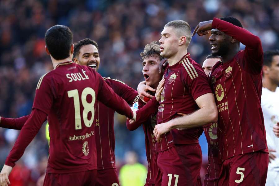 Artem Dovbyk of Roma (centre) celebrates after scoring his side's only goal against Cagliari