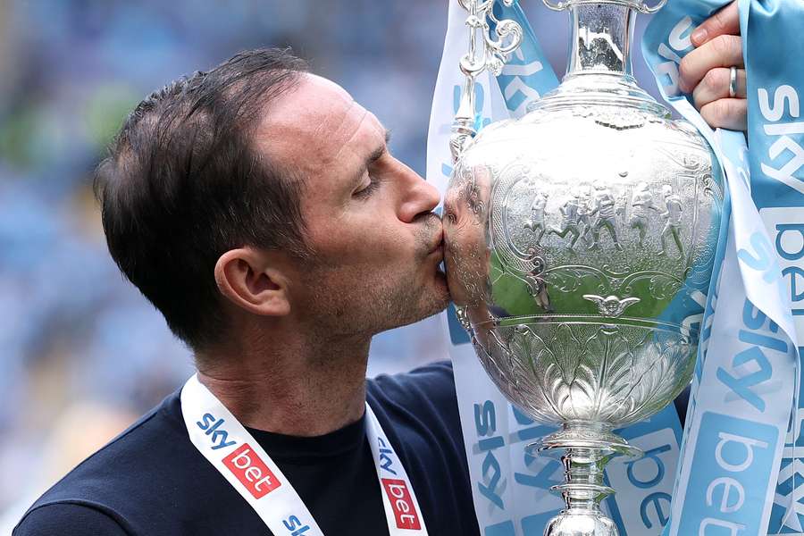 Frank Lampard of Coventry City kisses the Sky Bet Championship trophy 