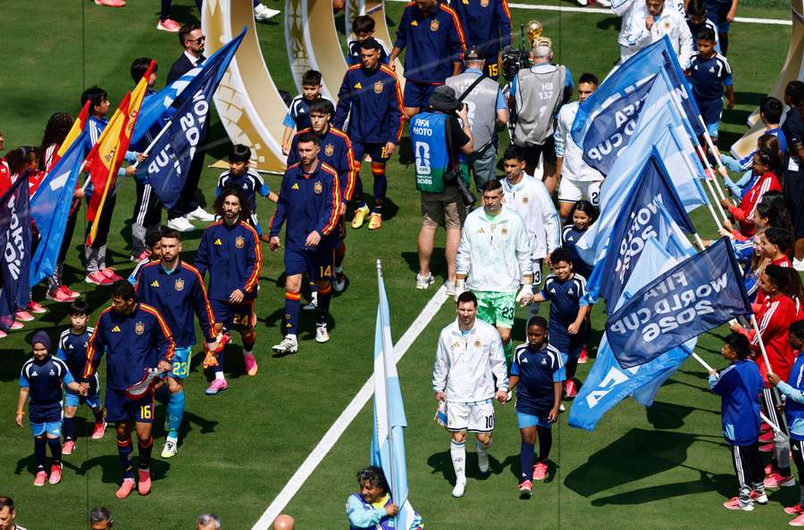 The players take to the pitch at the World Cup final The players take to the pitch at the World Cup final