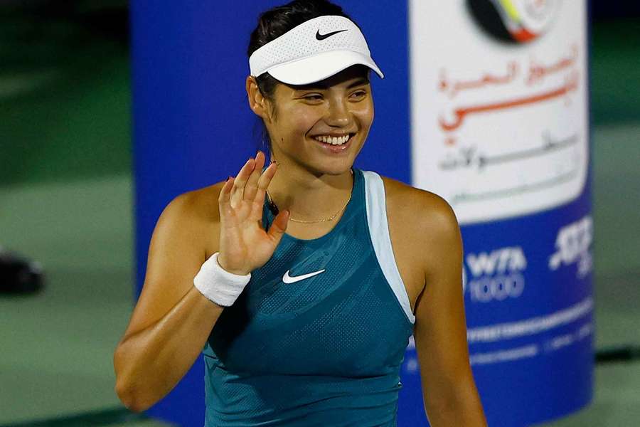 Emma Raducanu waves to the crowd in Dubai