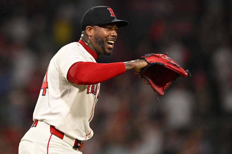 Boston Red Sox closer Aroldis Chapman smiling after a win (2025) Boston Red Sox closer Aroldis Chapman smiling after a win (2025)