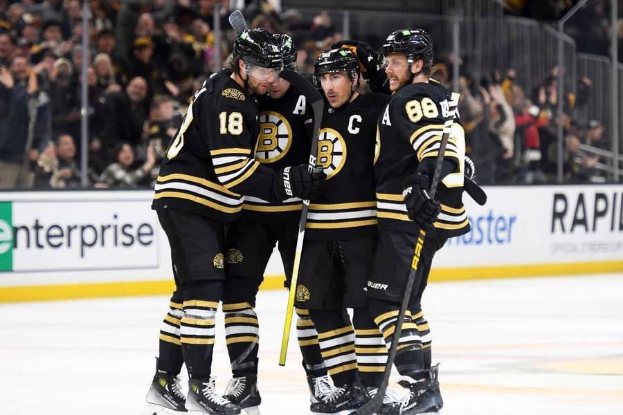 Boston Bruins' Brad Marchand celebrates scoring a goal during the third period against the Columbus Blue Jackets