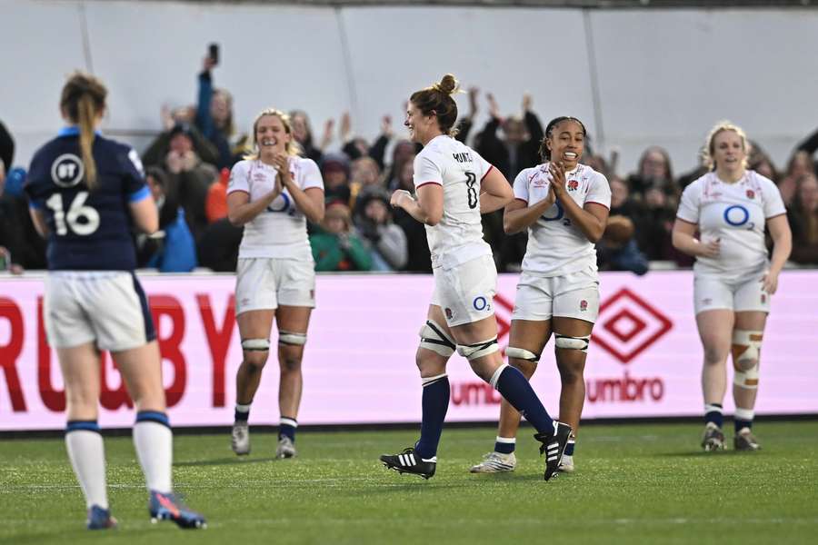 England's number 8 Sarah Hunter is applauded as she leaves the field