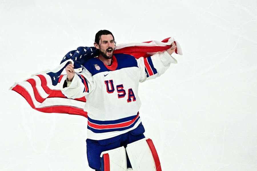 USA goalie Connor Hellebuyck celebrates gold medal at 2026 Winter Olympics