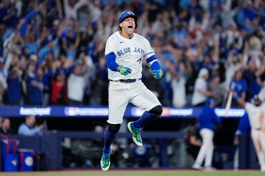 Blue Jays' George Springer reacts after hitting a home run in Game 7 of ALCS Blue Jays' George Springer reacts after hitting a home run in Game 7 of ALCS