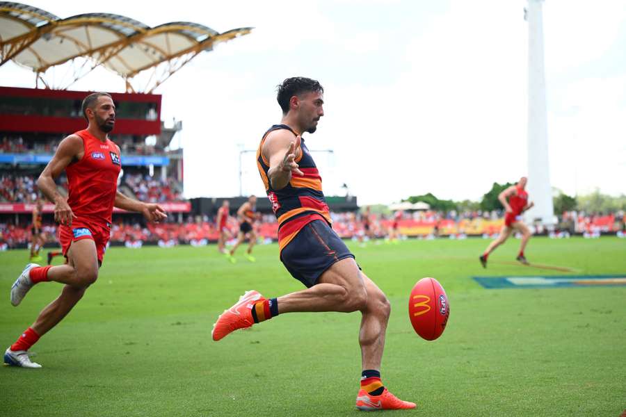 Izak Rankine kicks the ball during Adelaide Crows' Round 4 match against Gold Coast Suns on Saturday.