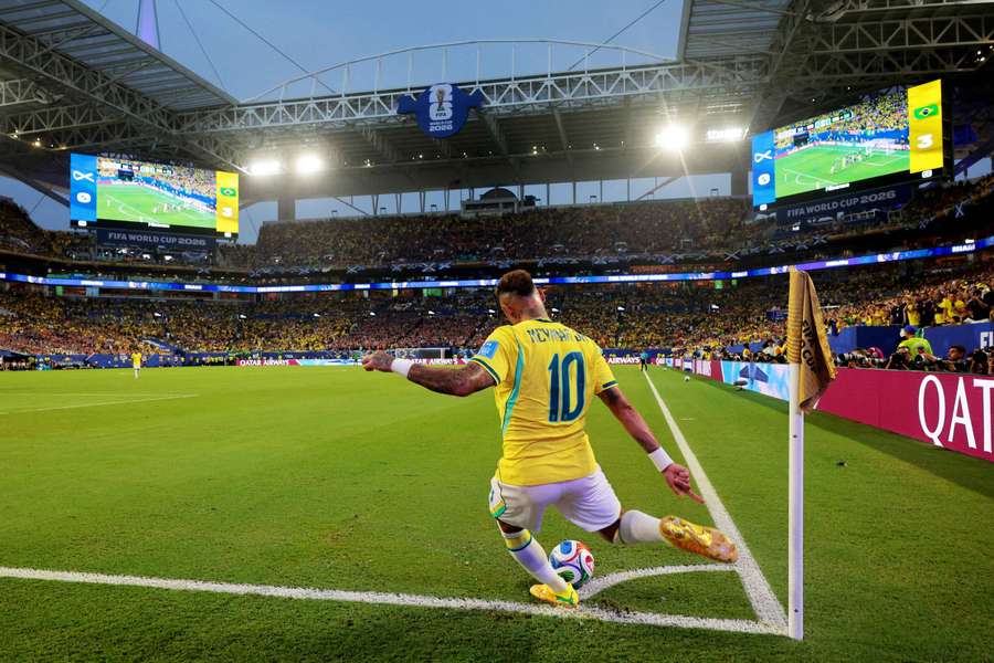 Neymar takes a corner against Scotland