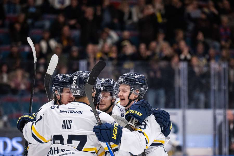 HV 71 players celebrate their win over Djurgarden HV 71 players celebrate their win over Djurgarden