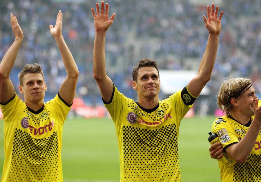 Lukasz Piszczek and Sebastian Kehl salute their fans