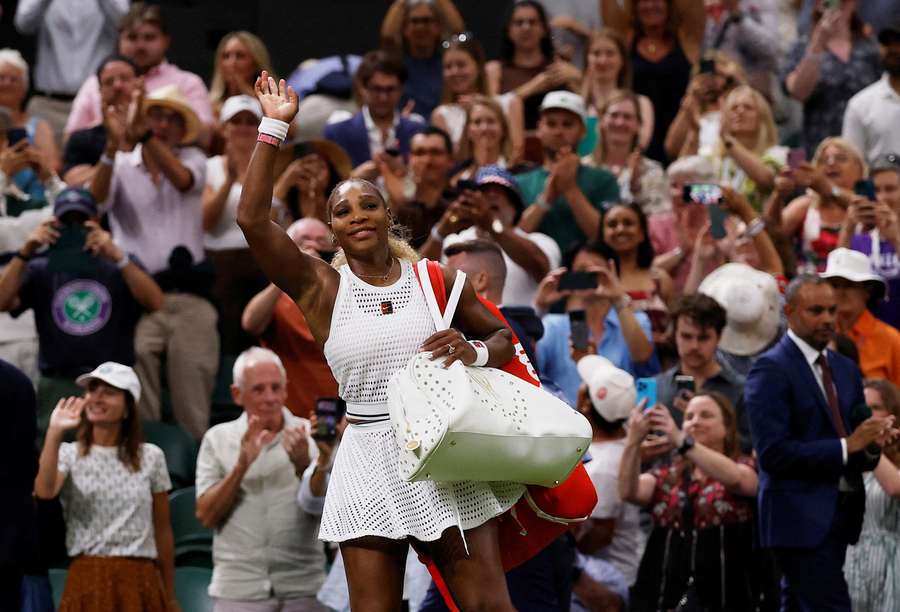 Serena waves to the crowd after her first-round loss Serena waves to the crowd after her first-round loss
