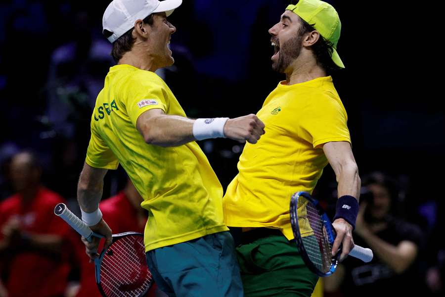 Australia's Jordan Thompson and Matthew Ebden celebrate winning their doubles match