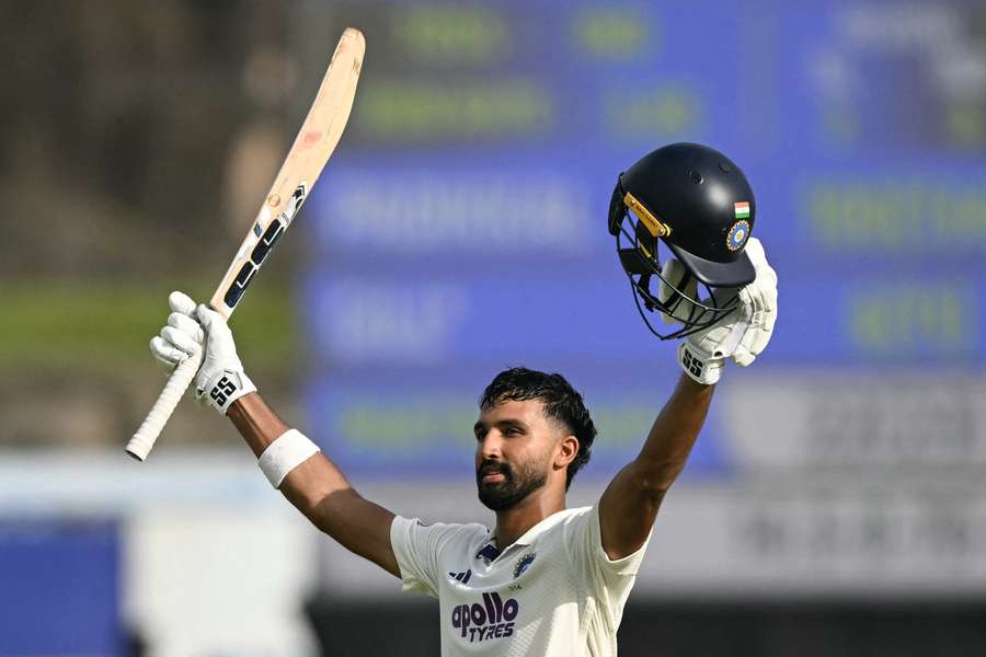 Devdutt Padikkal celebrates after scoring a century during the first day of the first Test cricket match between Sri Lanka and India
