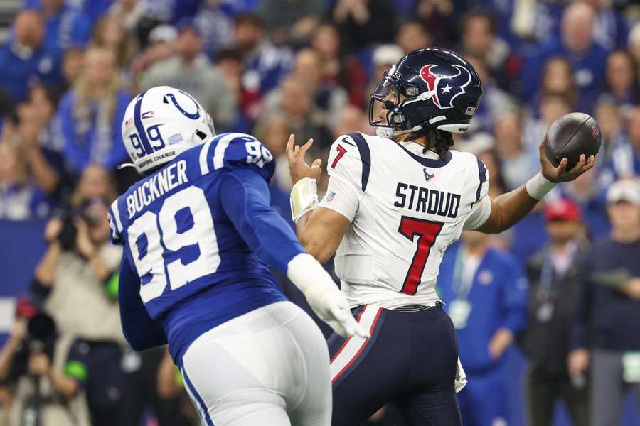 CJ Stroud of the Houston Texans throws a touchdown pass during the first quarter against the Indianapolis Colts