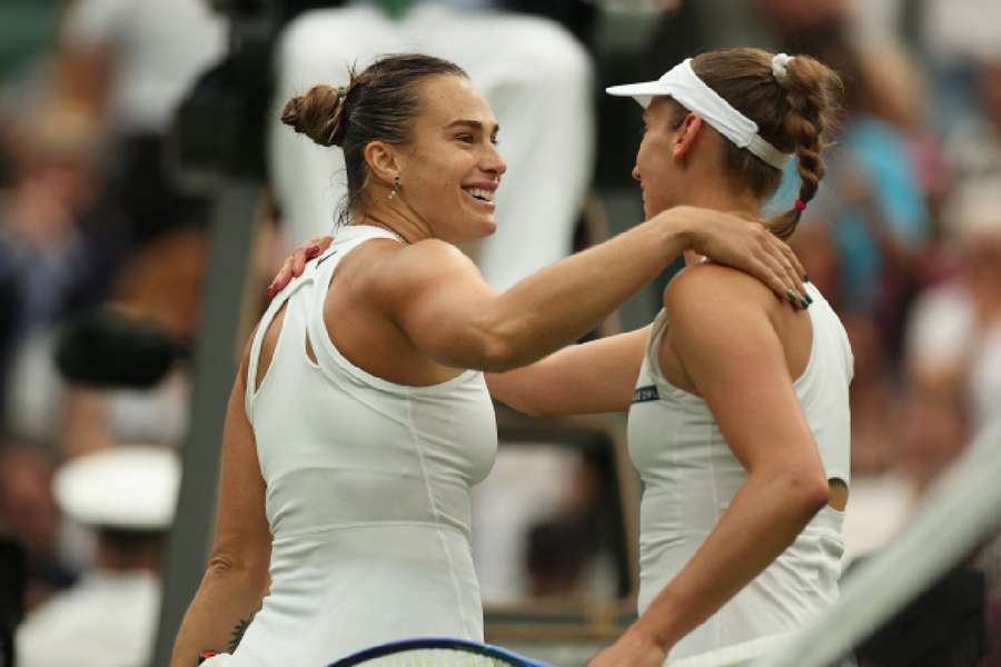 Aryna Sabalenka and Elise Mertens embrace after the match