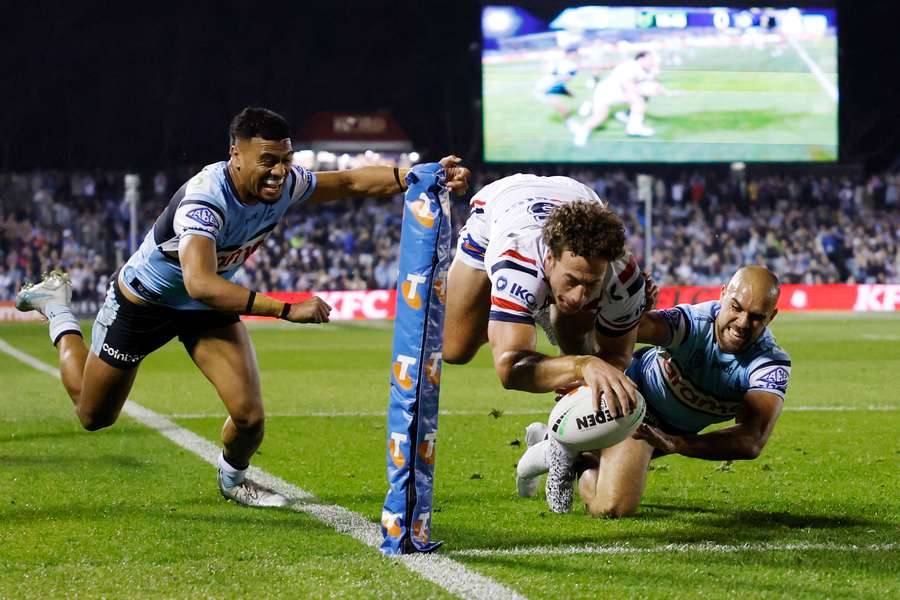 Mark Nawaqanitawase scores a try in Sydney's NRL elimination final against Cronulla. Mark Nawaqanitawase scores a try in Sydney's NRL elimination final against Cronulla.