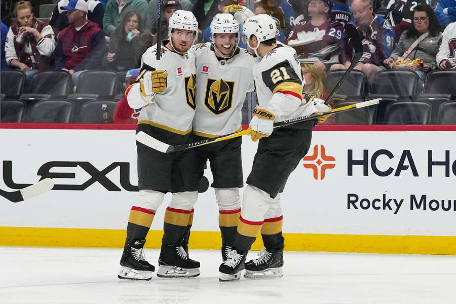 Vegas Golden Knights players celebrate a goal against the Colorado Avalanche