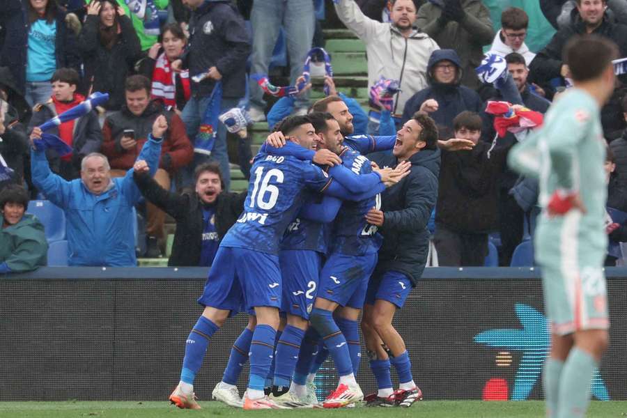 Getafe players celebrate their winning goal