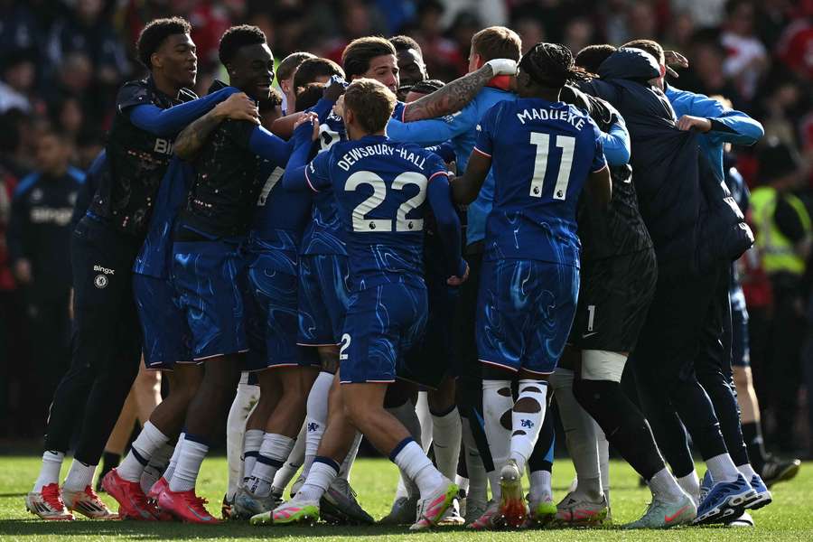 Chelsea players react at the final whistle