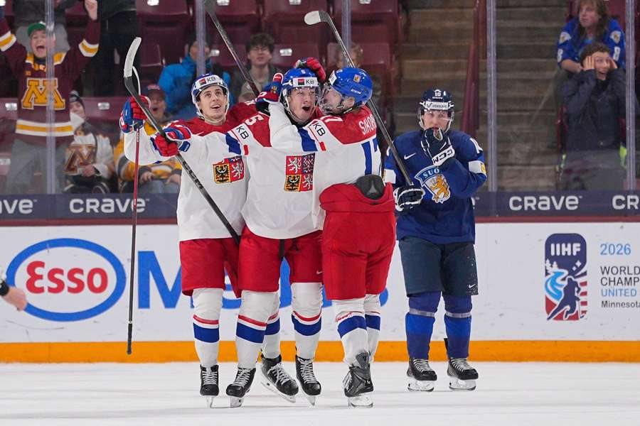 Adam Jiricek (centre) celebrates his game-winning goal