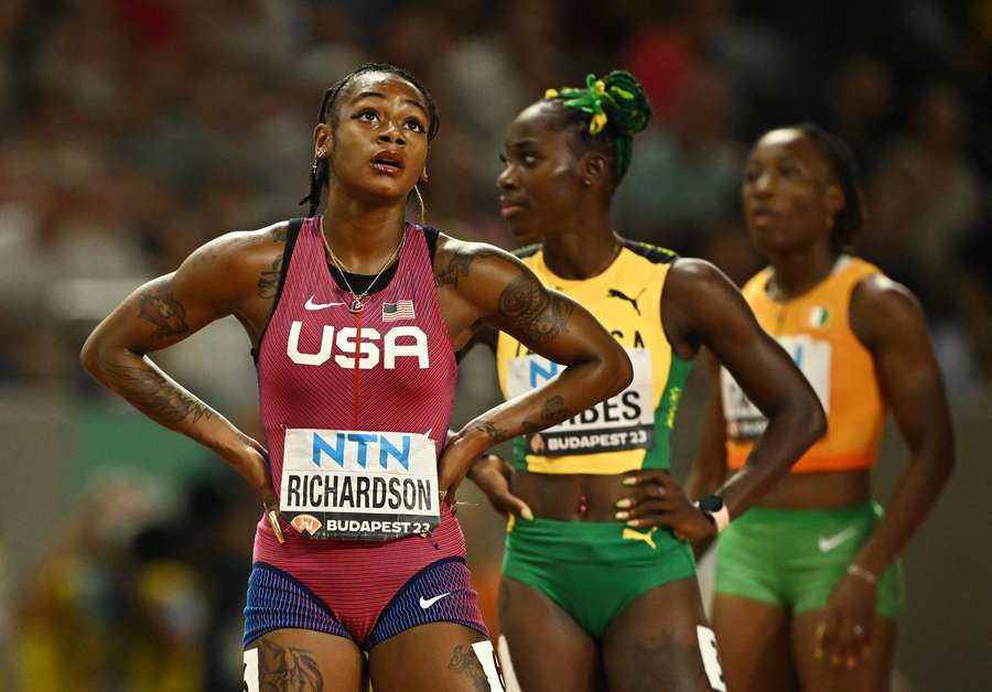 Sha'Carri Richardson looks on anxiously to see whether she has made the 100m final