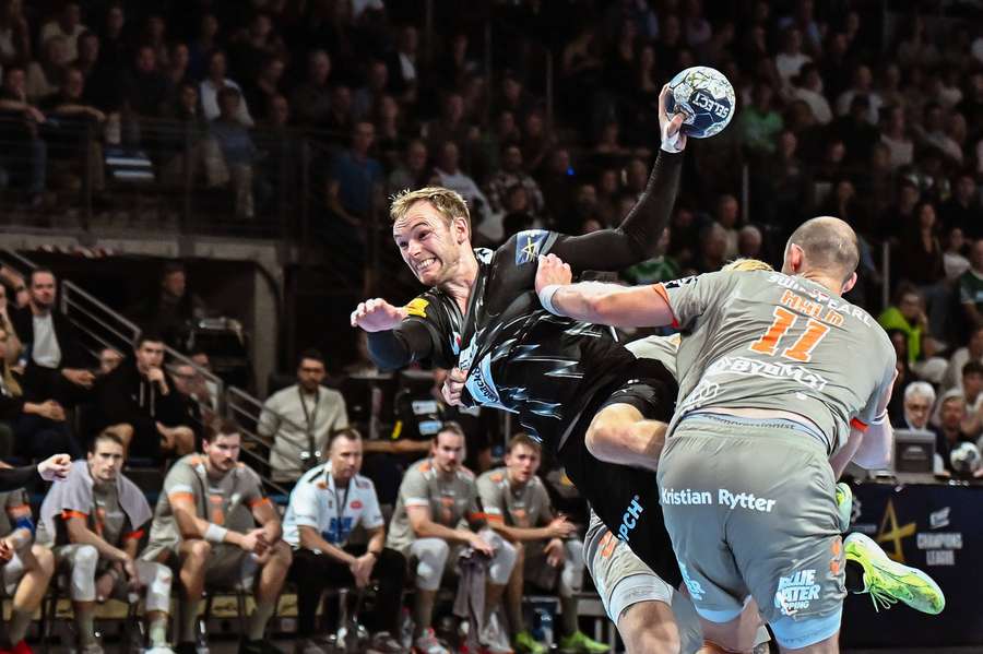 Mathias Gidsel in action against Aalborg Handball