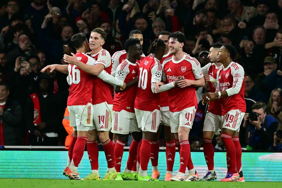 Arsenal players celebrate win Arsenal players celebrate win