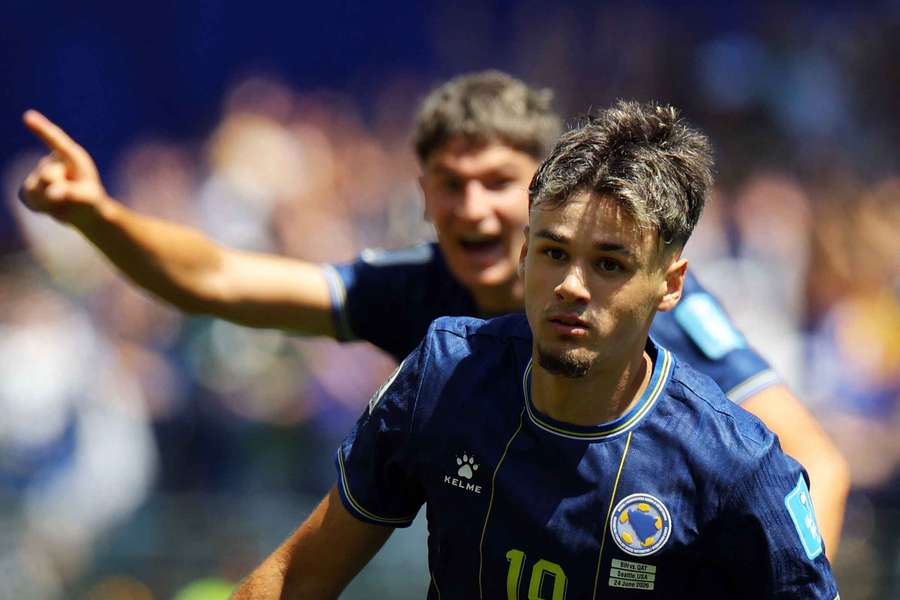Kerim Alajbegovic wheels away after scoring for Bosnia & Herzegovina