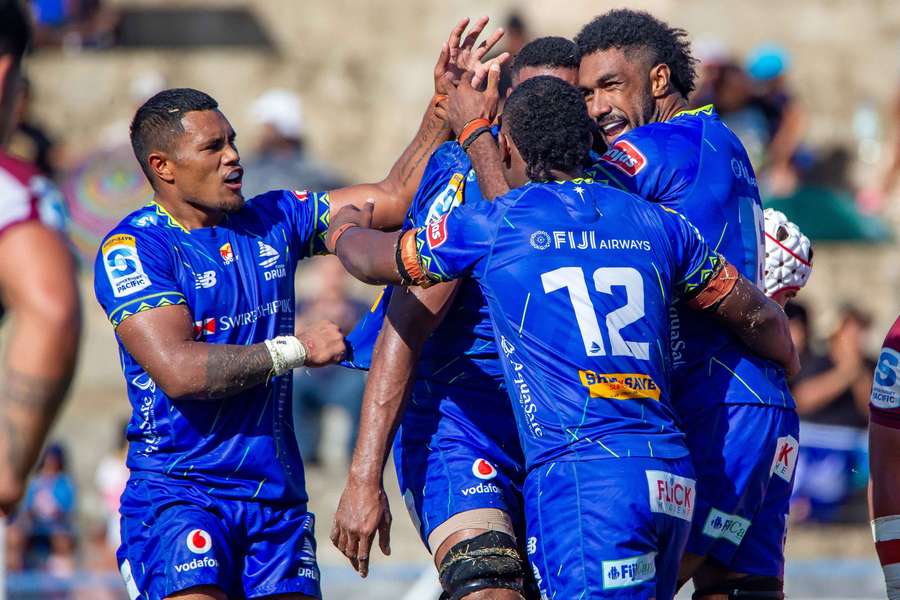Fijian Drua players celebrate a try during their weekend win over Queensland Reds.