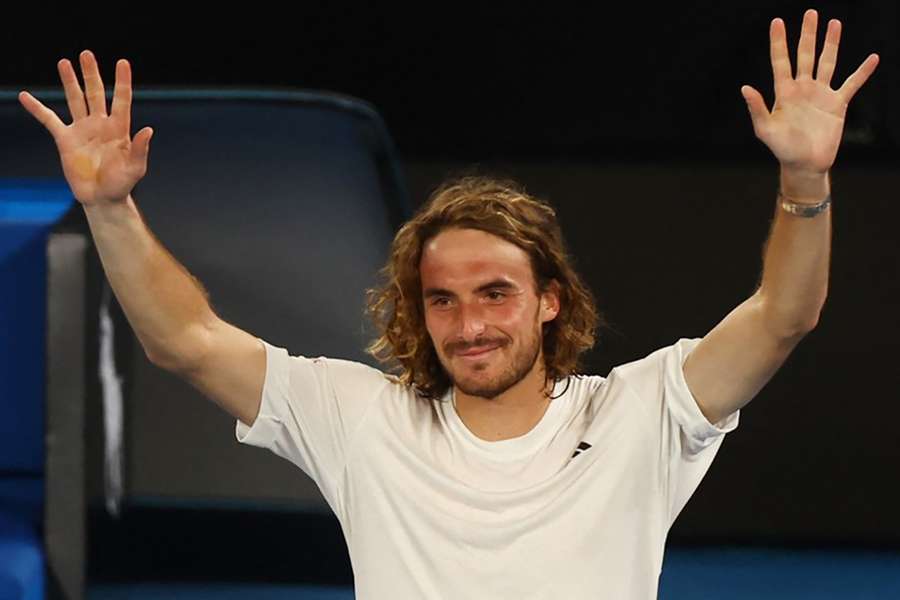 Tsitsipas waves to fans in Melbourne