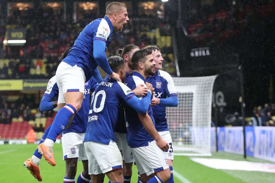 Sam Morsy celebrates scoring Ipswich's second goal against Watford to send them top of the Championship