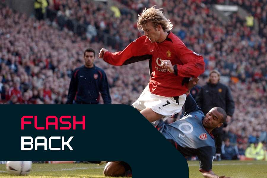 David Beckham is tackled by Ashley Cole during the FA Cup tie
