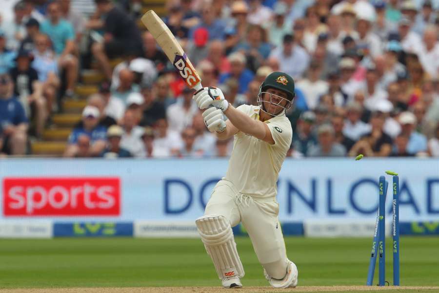 Australia's David Warner is bowled by England's Stuart Broad during play on day two of the first Ashes cricket Test match