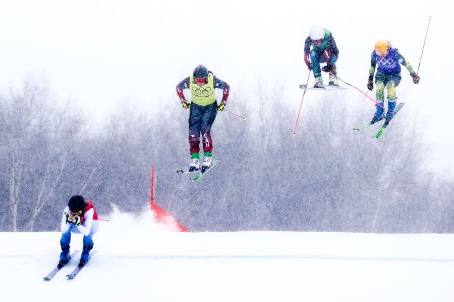Smith and Maier (far right) competing in the women's freestyle skiing ski cross big final at the 2022 Winter Olympic Games