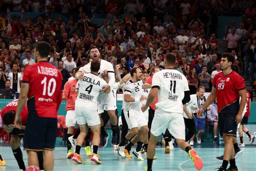 Germany players celebrate after they beat Spain