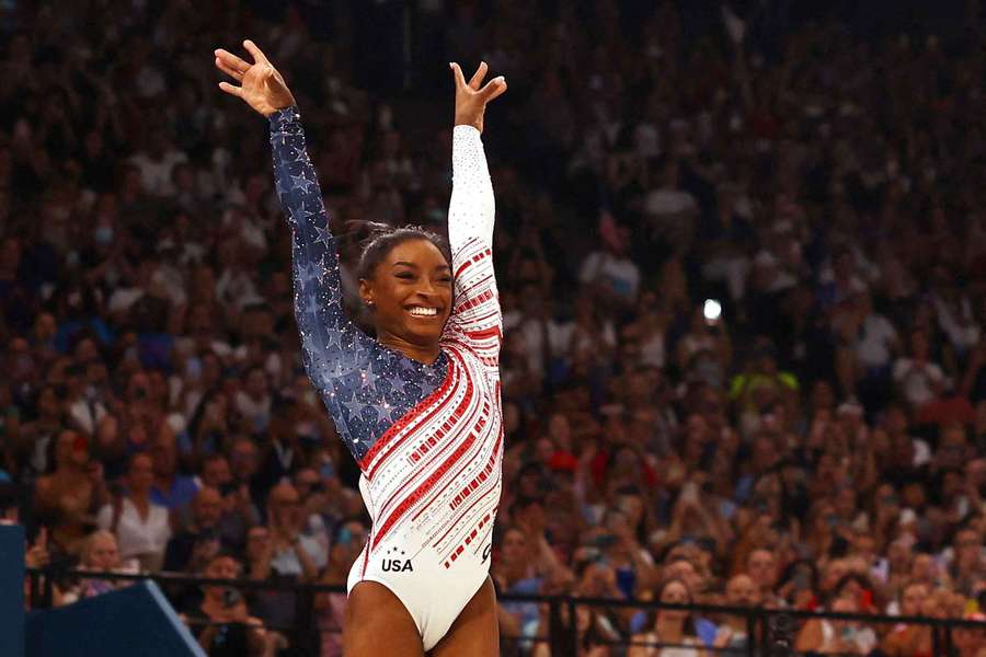  Simone Biles of the United States reacts after her performance on the vault