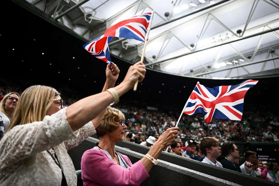 British fans wave their flags on Centre Court