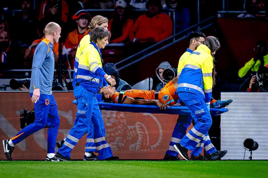 Ake goes off on a stretcher