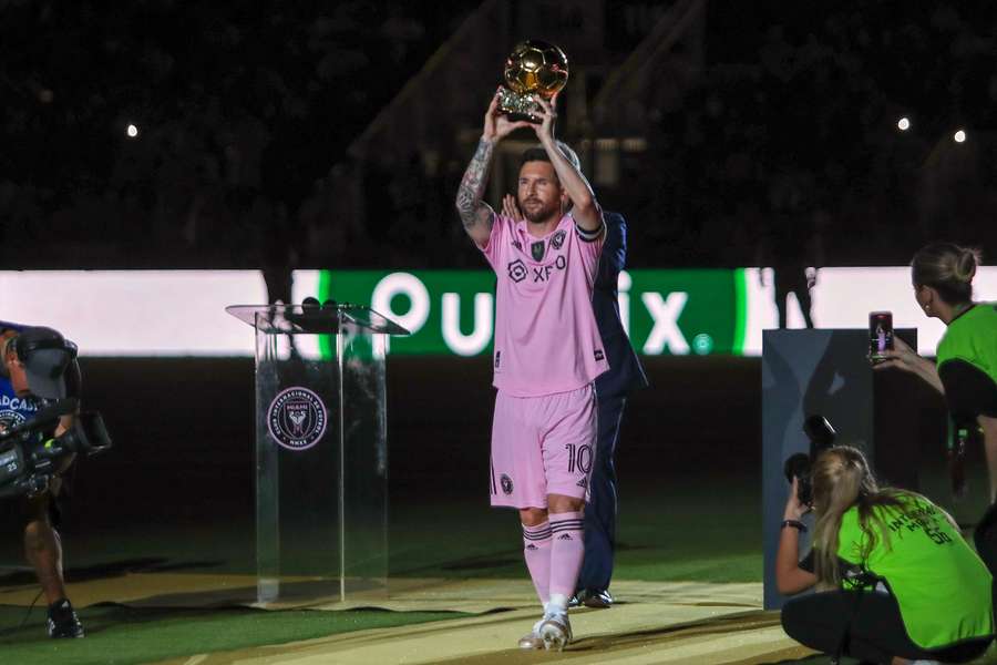 Messi holds up his eighth Ballon d'Or
