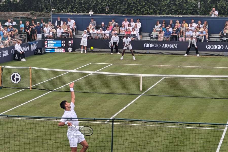 Djokovic serving against Tiafoe at Hurlingham