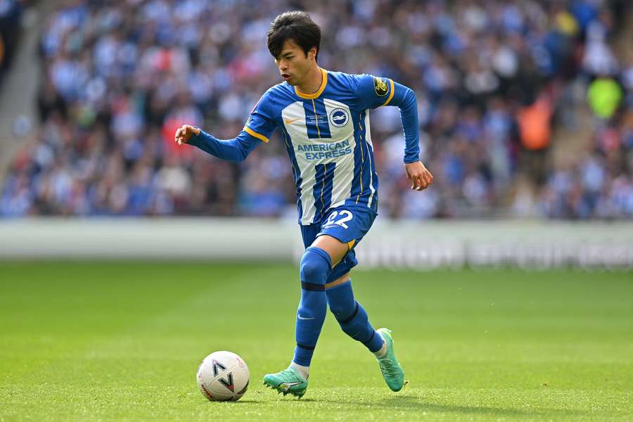 Brighton's Japanese midfielder Kaoru Mitoma runs with the ball Brighton's Japanese midfielder Kaoru Mitoma runs with the ball