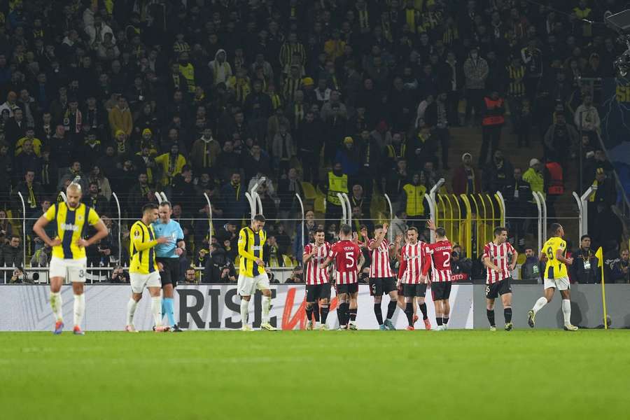 Athletic players celebrate