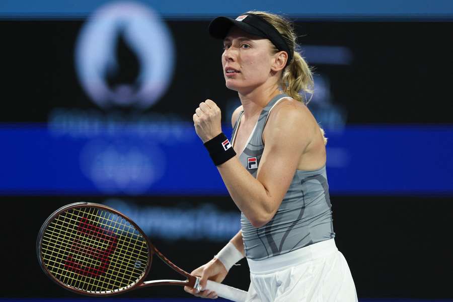 Ekaterina Alexandrova reacts after upsetting Iga Swiatek at the Miami Open on Monday