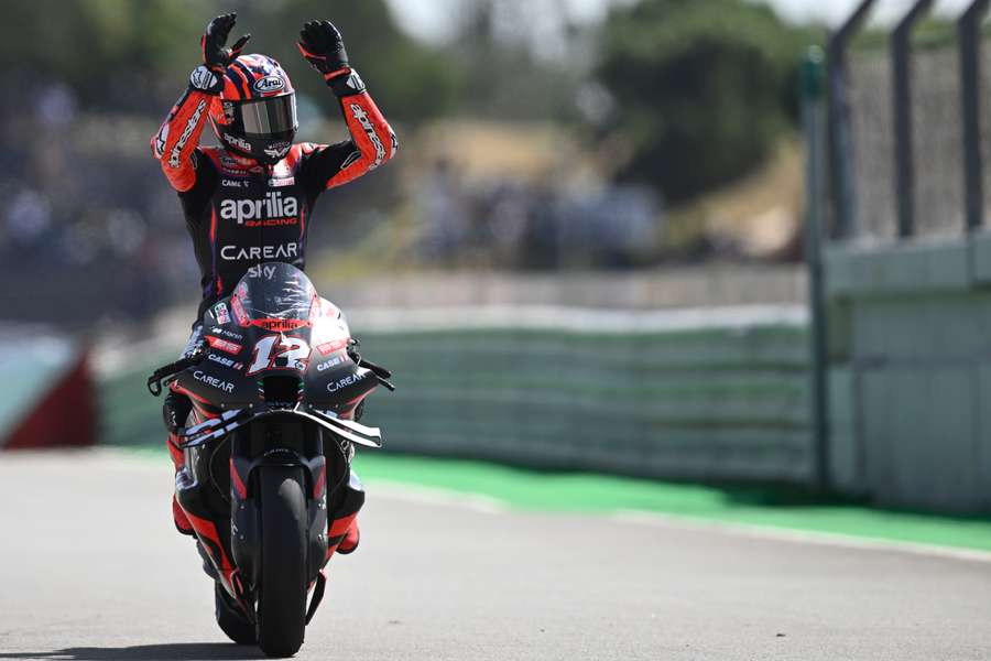 Maverick Vinales celebrates his second place after the MotoGP race of the Portuguese Grand Prix at the Algarve International Circuit