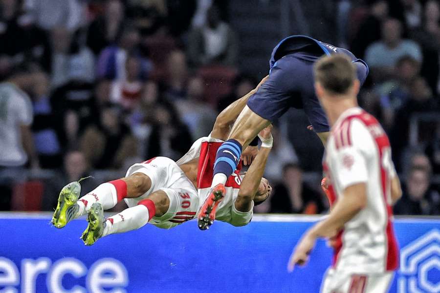 Aaron Bouwman goes down after a reckless challenge from Ruben van Bommel