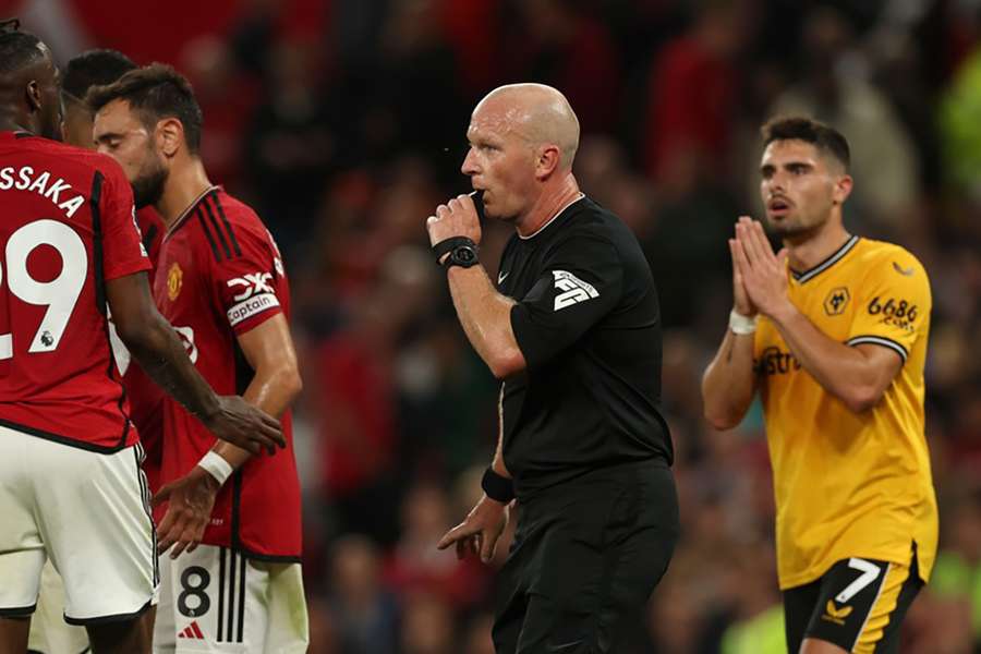 Referee Simon Hooper refuses to give a penalty