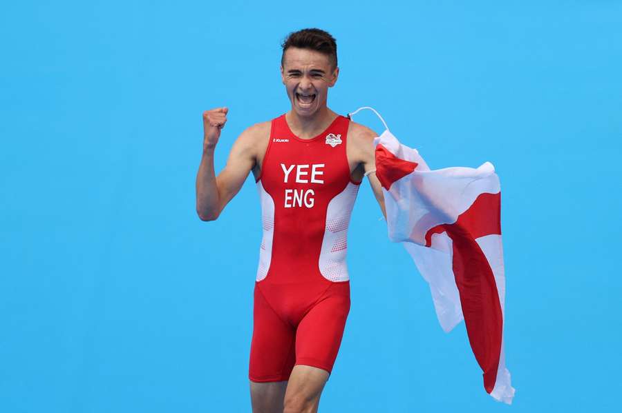 Alex Yee celebrates his Commonwealth Games victory