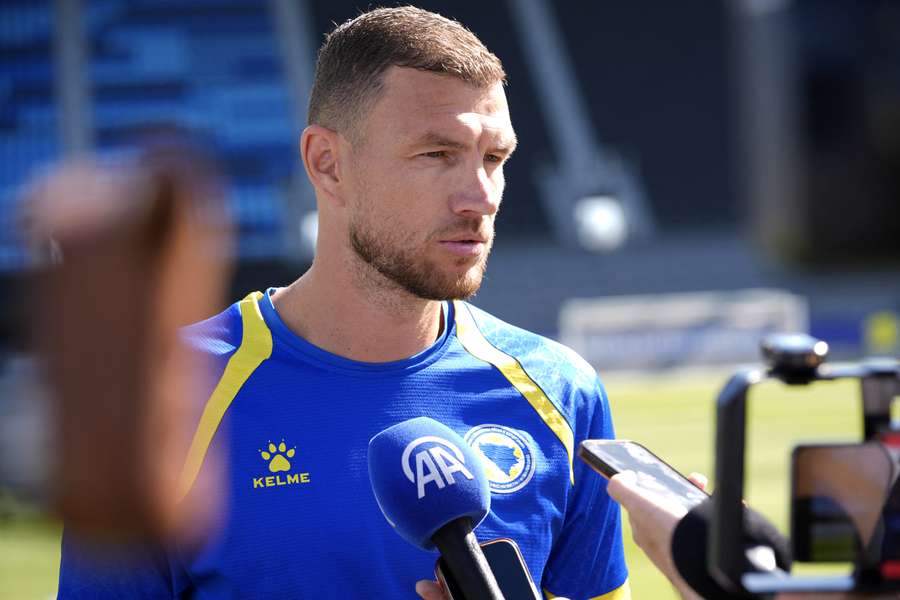 Edin Dzeko speaks to reporters during the World Cup