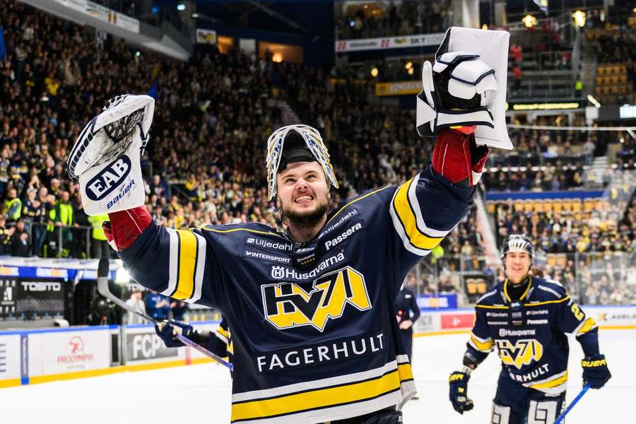 HV 71's Frederik Dichow celebrates his side retaining their place in the SHL for next season
