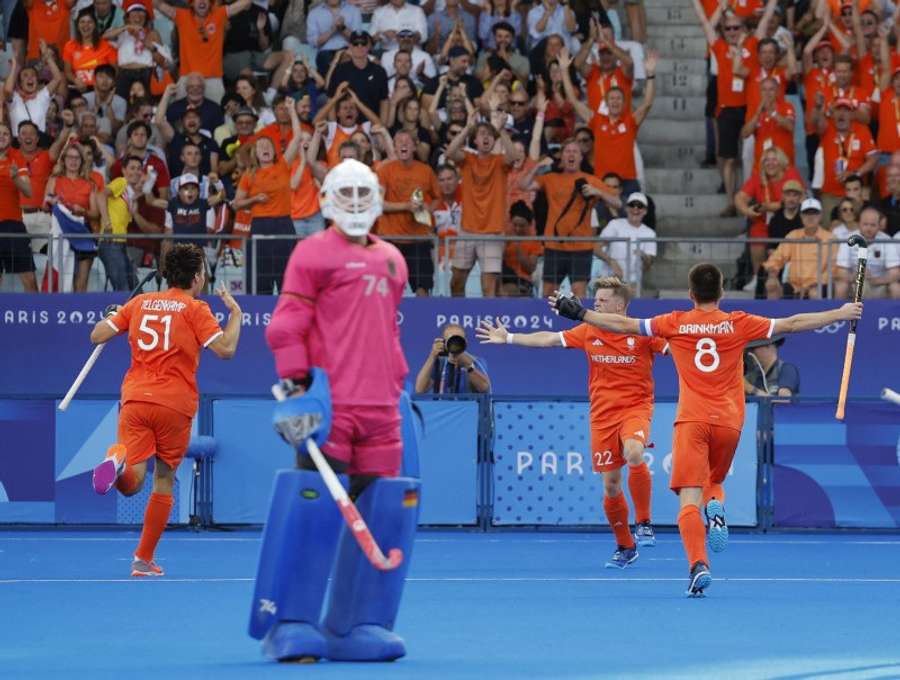 Thierry Brinkman, Duco Telgenkamp and Koen Bijen of the Netherlands celebrate their first goal